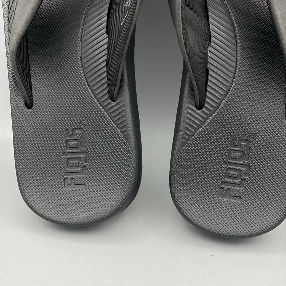 Flojos men’s black cushioned flip flops size 9.  New without tags.